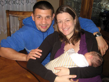 Paweł Wolak with his wife Heather and son Pawel Junior